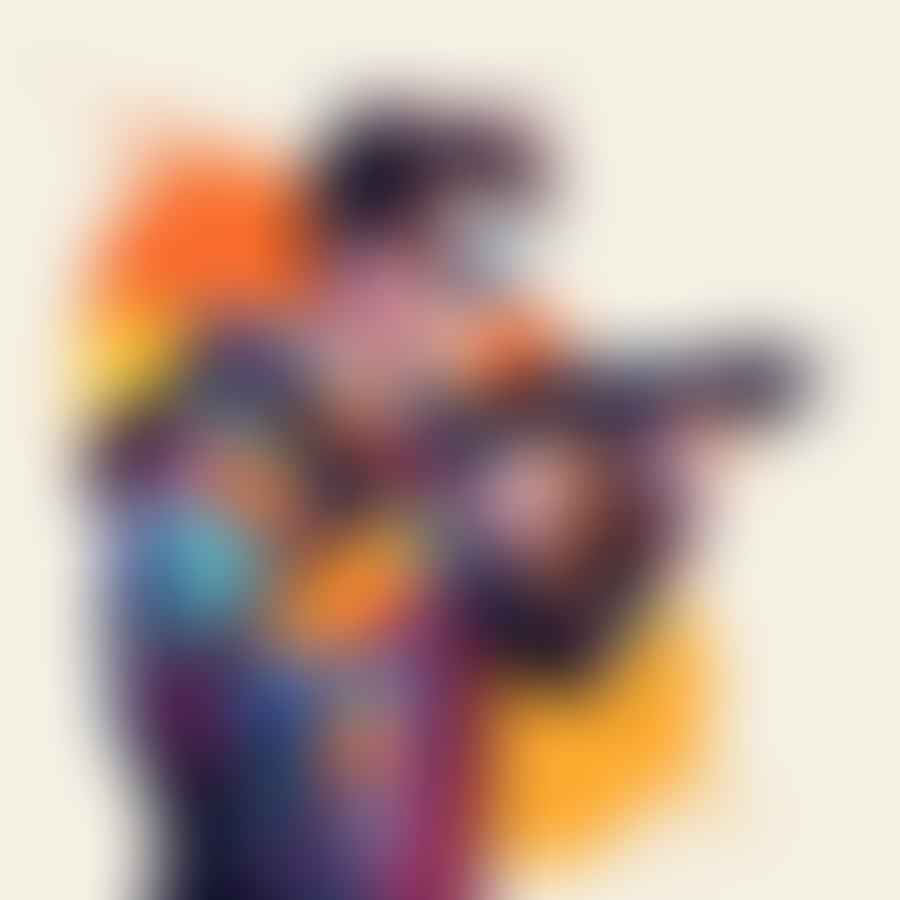 A person holding a Nerf blaster, studying its features.