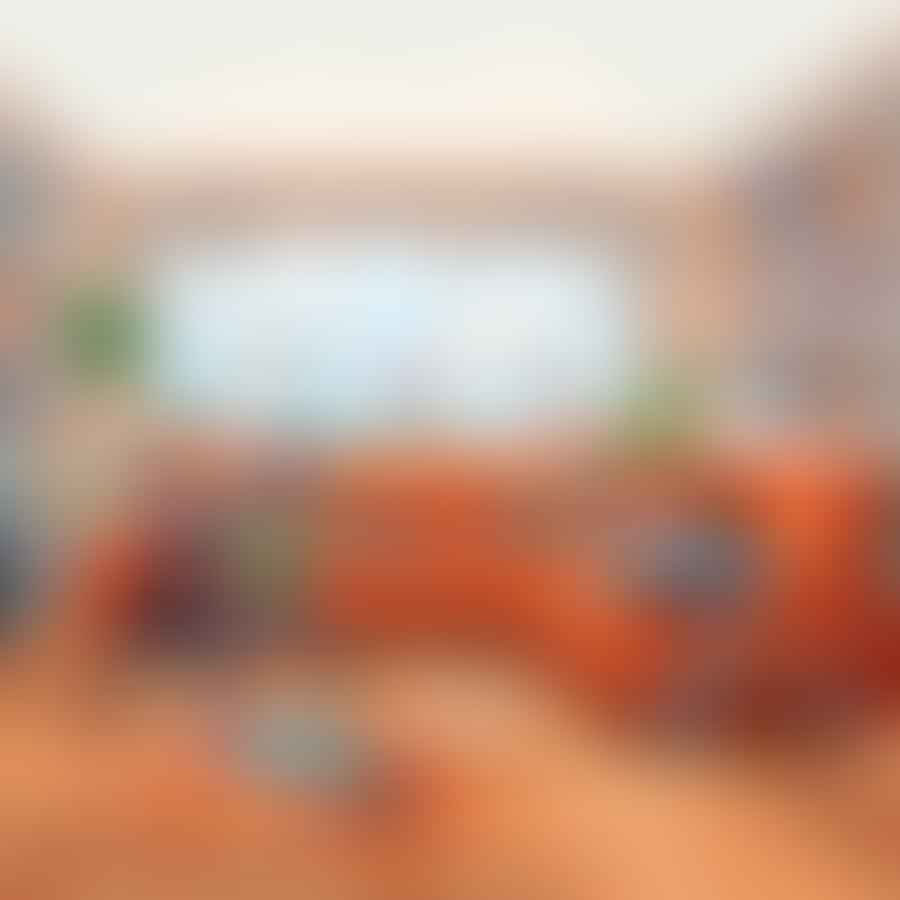 Kids starting a Nerf battle in a living room